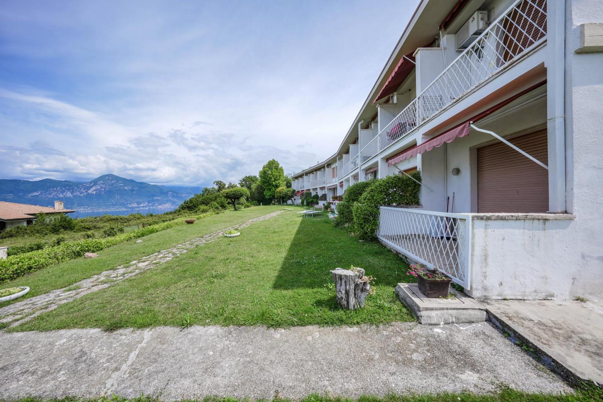 Апартаменты Garda Panoramic House Альбизано Экстерьер фото