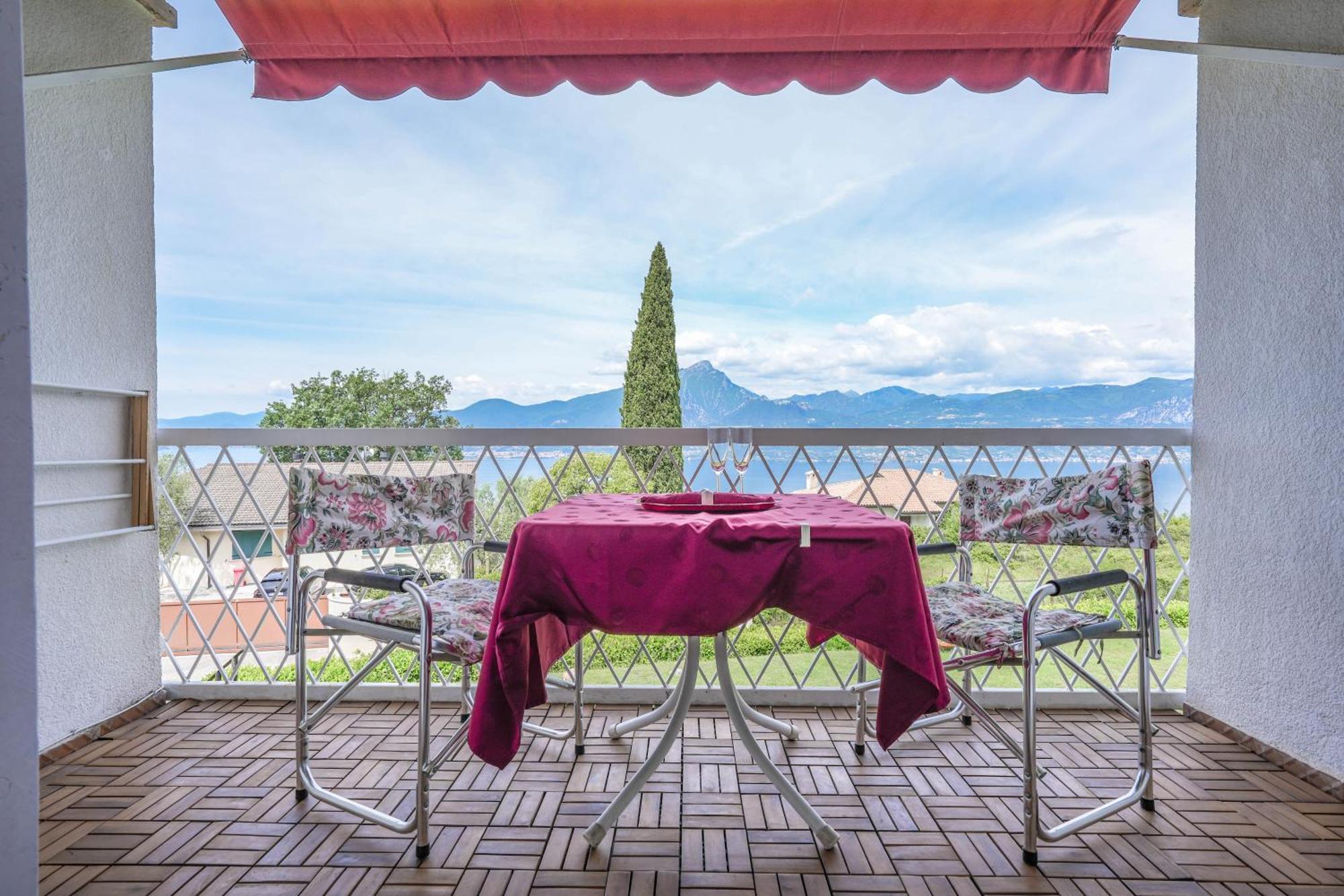Апартаменты Garda Panoramic House Альбизано Экстерьер фото