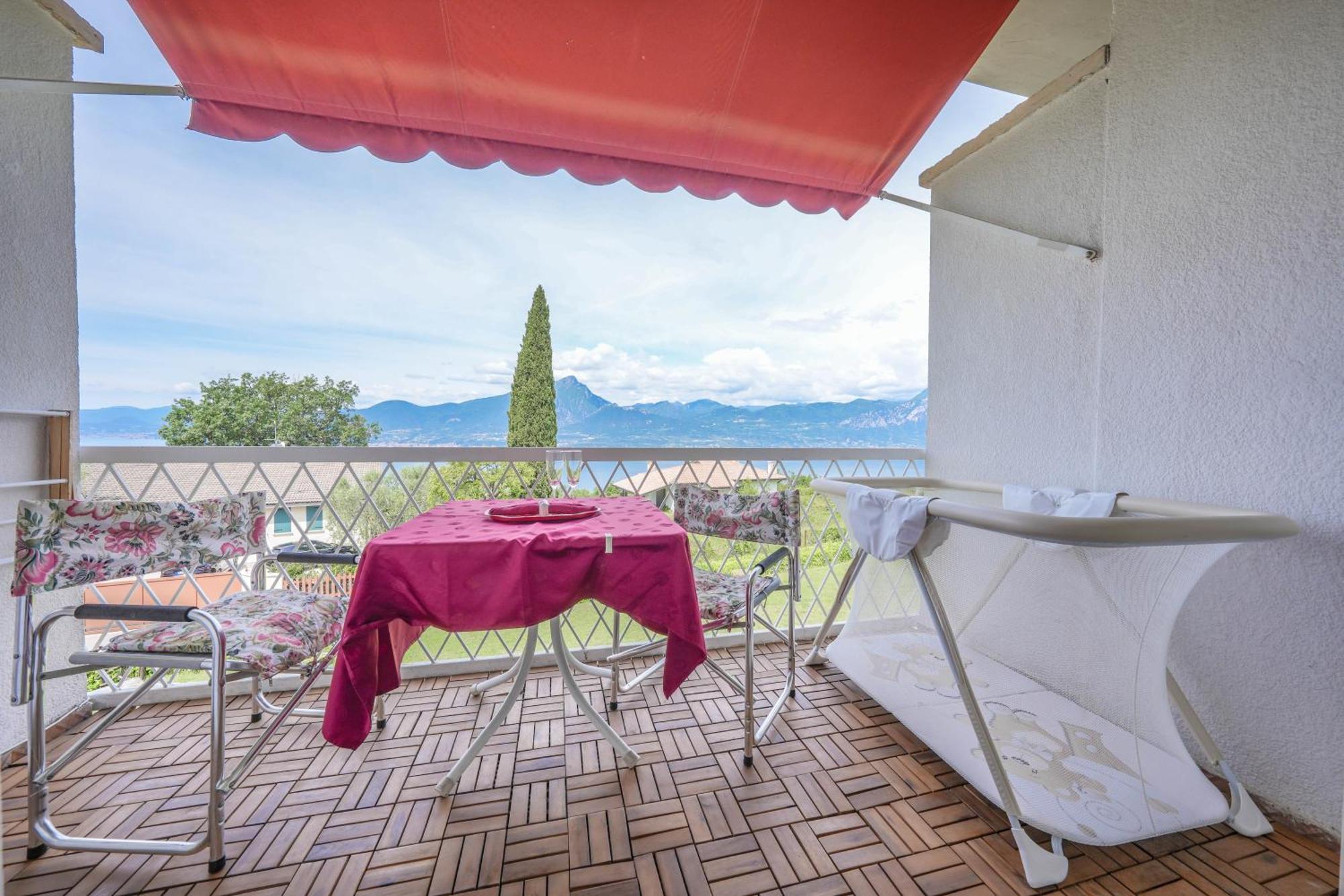 Апартаменты Garda Panoramic House Альбизано Экстерьер фото